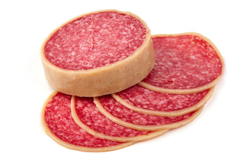 Dry cured salami sausage with slices isolated on white background.