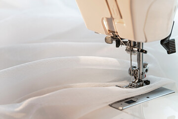 Machine with fabric. Close-up. Copy space.