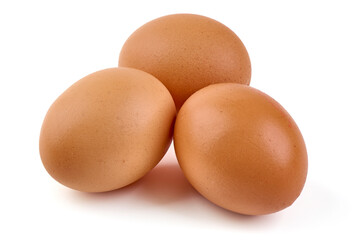 Three fresh brown eggs isolated on white background.