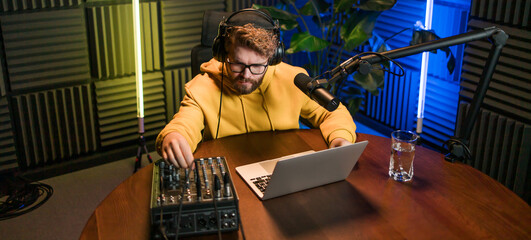 Banner Handsome man radio DJ hosting a radio show, entertainment and communication concept. Copy...