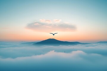 Obraz premium Eagle Soaring Above Misty Mountain Sunrise.