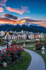 Obraz premium breathtaking view of mountain peaks at sunset with luxurious villas and blooming rose garden 