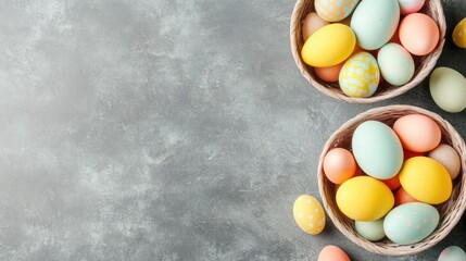 Colorful Easter eggs in small woven baskets on a gray background