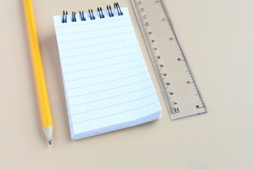 Stationary supply. Pencil, paper and ruler.