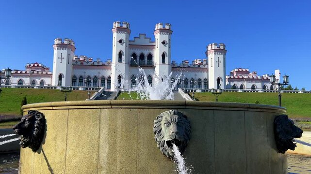 The Puslovsky Palace in Belarus. The Kossovsky Autumn Castle. An old historical castle in Kosovki in sunny weather in autumn. An architectural monument in the style of English Neo-Gothic. 4K