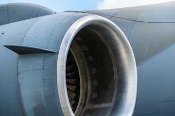 close-up view of jet engine intake and fan blades.