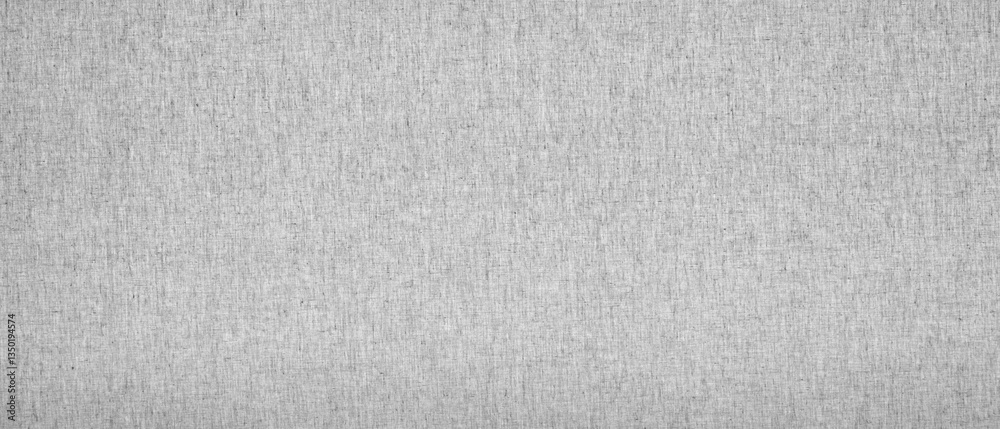 Poster Gray  wall with rough texture as a background for a template or banner. wall is made of stone and has a gray color
