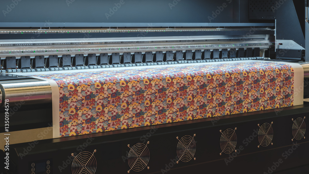 Poster a large printer is printing a colorful piece of fabric with a floral pattern. the printer is black a
