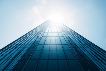 Fototapeta premium Colossal glass skyscraper glistens in radiant sunlight, epitomizing modern urban architecture and innovative design brilliance