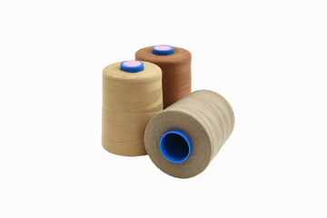 set of beige and brown threads isolated on white