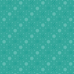 Colorful candy-themed seamless pattern on teal background, featuring lollipops, swirls, and circles for festive designs, kids' parties, and playful decorations.