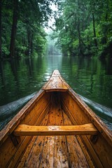 Calm canoeing experience on a tranquil river surrounded by lush greenery under cloudy skies