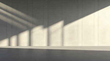 Sunlight casts shadows on a light beige wall, creating a serene and minimalist interior scene