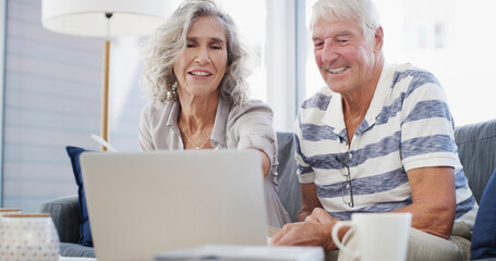 Happy, old couple and laptop on sofa for budget, financial management and retirement plan. Senior people, man and woman with digital for reading, review insurance policy and online investment at home