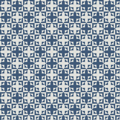 Fototapeta premium Geometric pattern in navy blue and cream, intricate star shapes and diamond designs for backgrounds, textiles, wallpaper, cards, and banners.