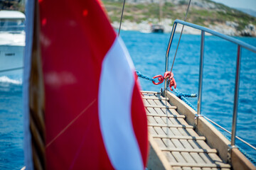 Obraz premium Turkish Flag Waving on a Touristic Yacht