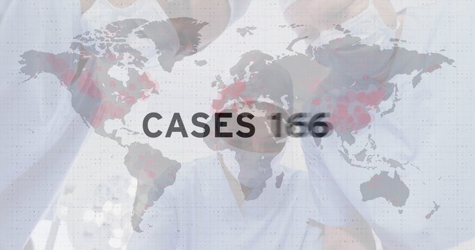 Healthcare workers analyzing global cases data on world map overlay - Powered by Adobe