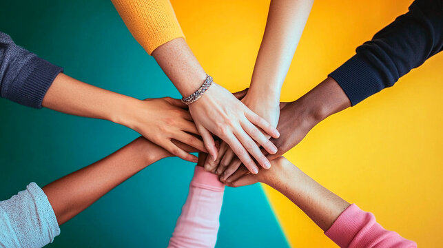 All hands together united diversity or multi-cultural partnership in a group multi color