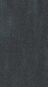 An abstract distressed grainy grunge texture motion graphic background loop.