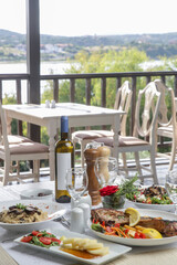 Various Mediterranean dishes served on the restaurant table