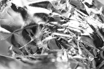 Close up texture of crumple chocolate wrapper as background