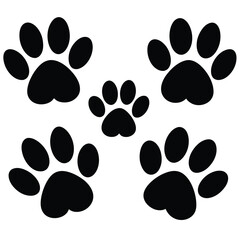 Fototapeta premium Set of black animal paw prints and cat silhouettes