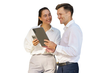 Colleagues engaging in a friendly discussion while using digital devices in an office setting