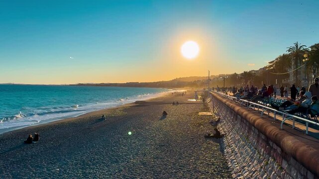 Promenade des Anglais on sunset on the seashore in Nice, Provence, Alps, Cote d'Azur France February 27, 2025. High quality 4k footage