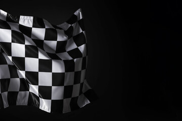 One racing checkered flag on black background, space for text