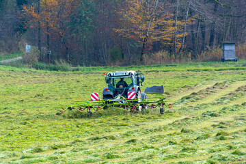 Tractor with Tedder in the Field