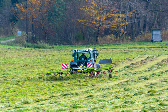 Tractor with Tedder in the Field