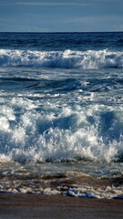 Waves breaking on the beach in Zipolite, Mexico