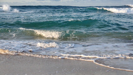 Waves breaking on the beach in Zipolite, Mexico