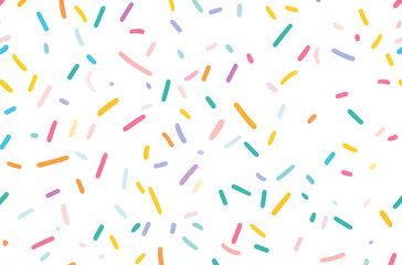 Colorful sprinkles falling on a white background