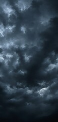 Obraz premium Dark storm clouds filling the sky, creating a dramatic and moody atmosphere. The swirling patterns of clouds add intensity, evoking a sense of nature's power. Ai generative