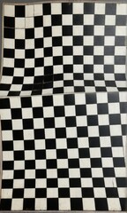 Fototapeta premium Warped Black And White Checkered Pattern Abstract Design