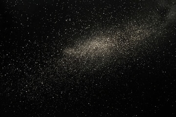 Fototapeta premium mesmerizing cosmic dust cloud sparkles against deep black space background