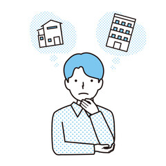 マンションと一戸建てと悩む男性