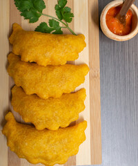 Empanadas: Traditional Colombian Appetizer with Sauce