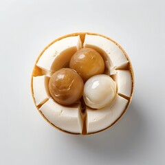 Creamy Dessert with Three Spheres in a Golden Bowl
