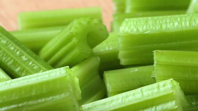 Fresh celery on wooden background