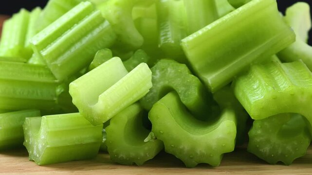 Fresh celery on wooden background