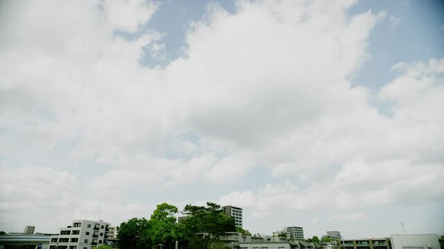 city, cityscape, multi-tenant building, condominium, sky, cloud, time-lapse