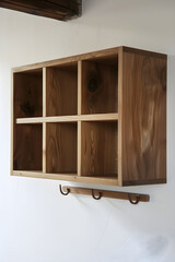 Wall-Mounted Wooden Shelf with Cubicles and Hooks: An Epitome of Functionality and Style