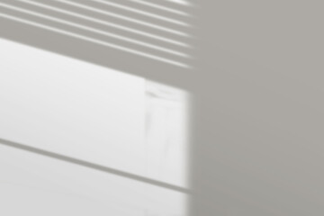 Shadow dances across the wall cast by the blinds. Perfect for illustrating dramatic lighting, moody...