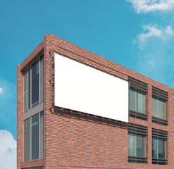 Blank billboard mounted on a brick building, perfect for showcasing advertisements, announcements, promotions, or directions in an urban setting.