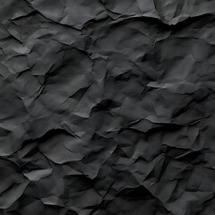 A textured close up of crumpled black paper detail