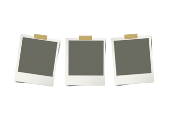 Blank instant photos on a white surface. Suitable for school projects, scrapbooking, retro designs, and creative concepts about memories.