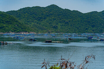 Fishing village on the water.
South China Sea, Vietnam. Floating fishing villages.