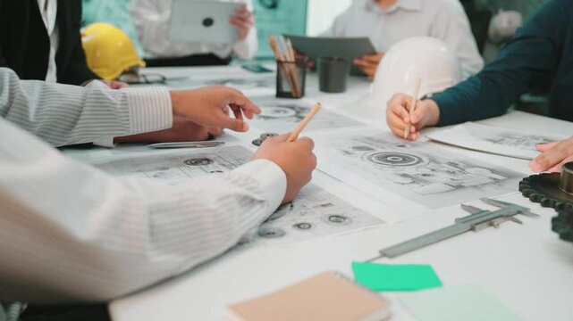 A vibrant meeting scene showcasing teamwork among engineers discussing project plans, utilizing collaborative tools and creating innovative strategies on a well-organized workspace. SACTR